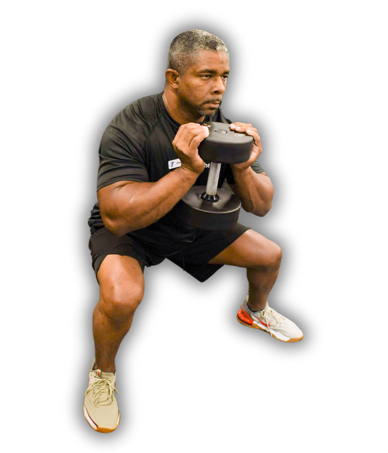 Shawn Sofield doing a squat with a handweight Shawn Sofield doing a squat with a handweight
